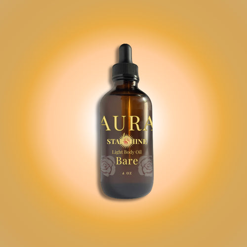 Bottle of 'GLOW Starshine' rich body oil on a gradient orange background