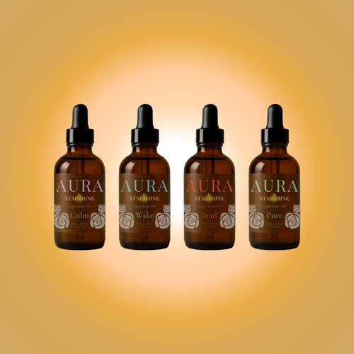 Four AURA Starshine dropper bottles on a gradient yellow background