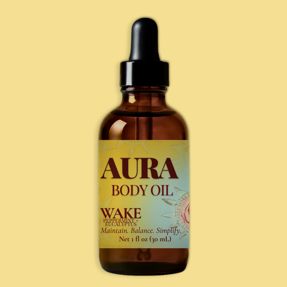 A 1 fl oz amber glass dropper bottle of Aura Body Oil, Wake Peppermint and Eucalyptus, centered against a solid pale yellow background.